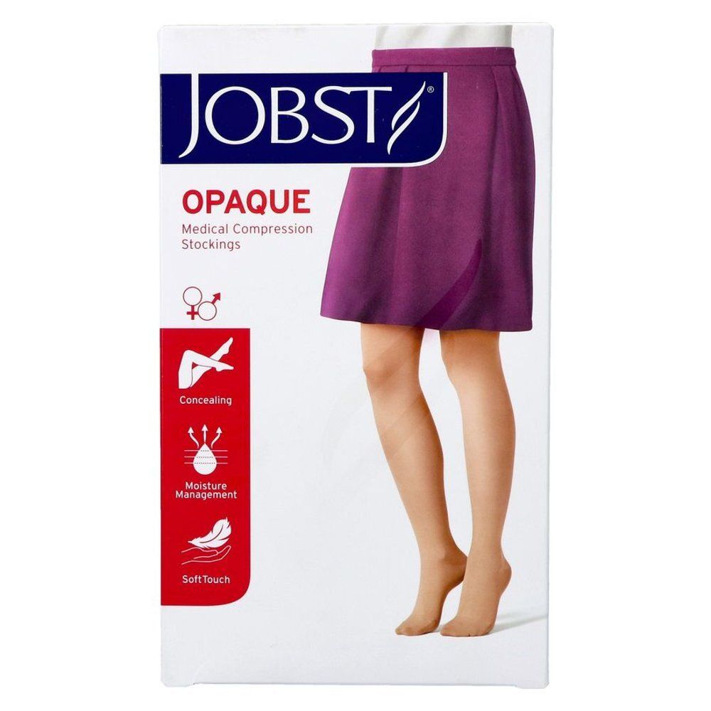 Bas cuisse de compression JOBST Opaque, classe 1, couleur chair, taille M. Emballage avec illustration du produit.