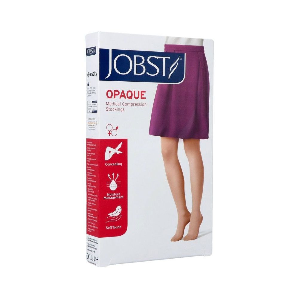 Bas de contention opaques couleur chair, longueur cuisse.