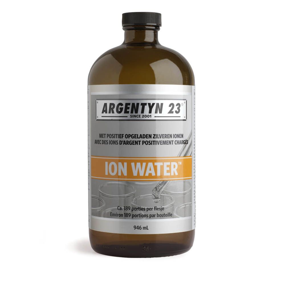 Bouteille en verre brun avec bouchon noir. Étiquette avec nom du produit et texte. Contient 946 ml.