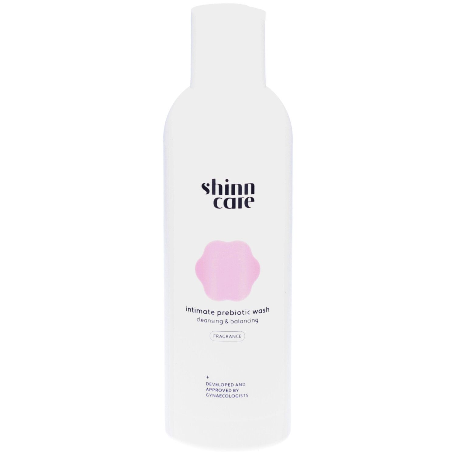 Flacon blanc avec fleur rose et texte. Lotion intime Shinncare. Cleansing & Balancing.