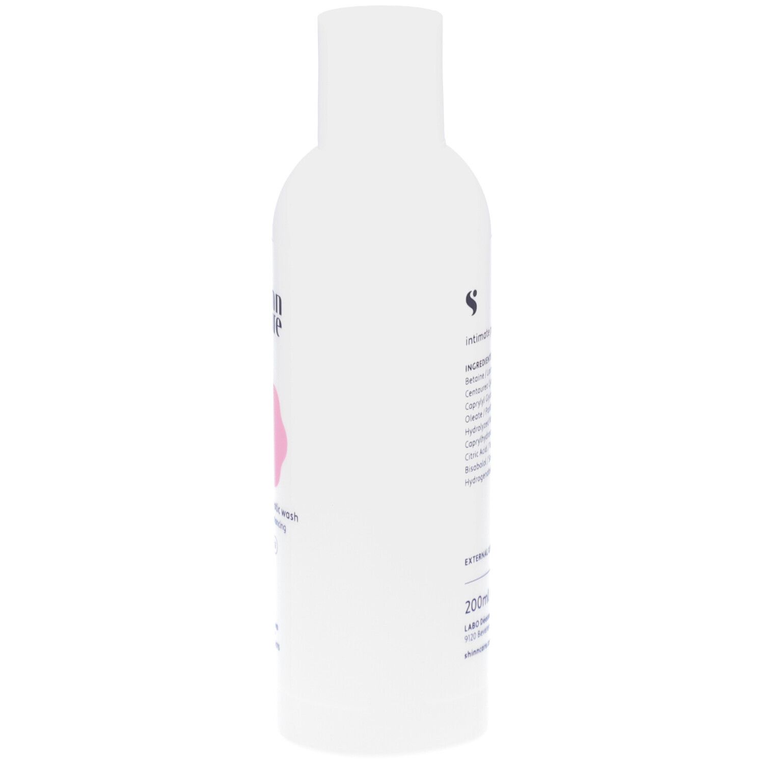 Flacon blanc avec fleur rose et texte. Lotion intime Shinncare. Cleansing & Balancing.