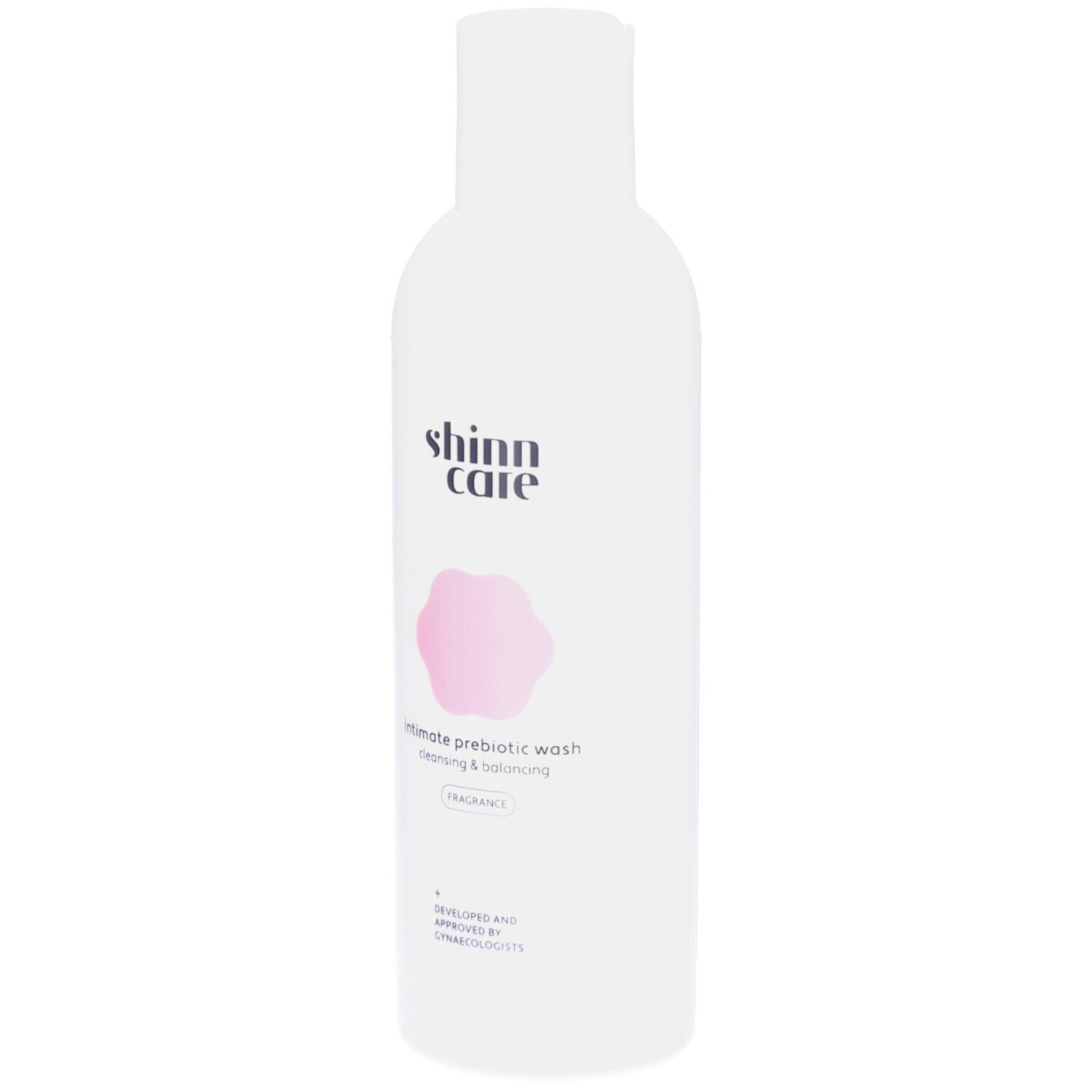 Flacon blanc avec fleur rose et texte. Lotion intime Shinncare. Cleansing & Balancing.