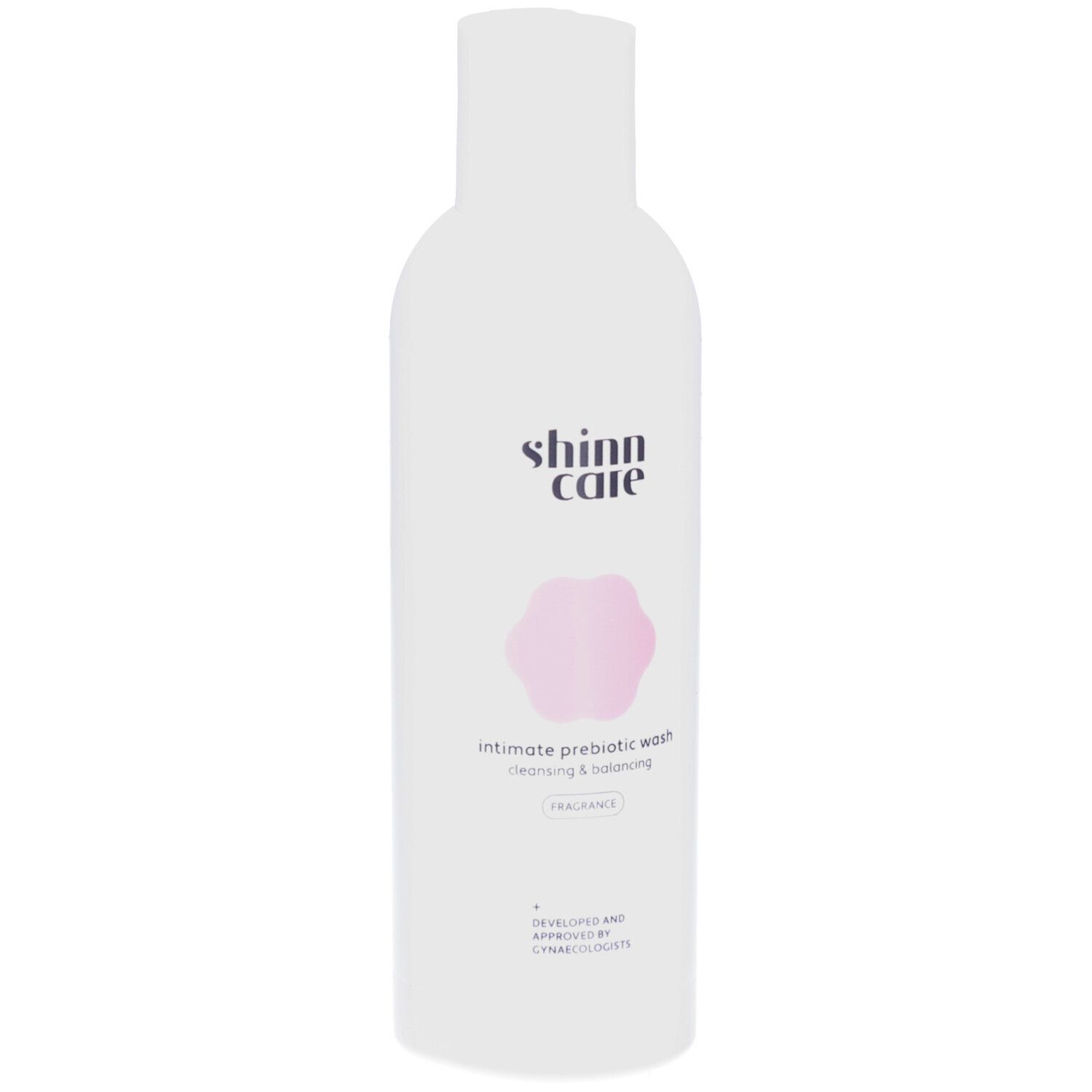 Flacon blanc avec fleur rose et texte. Lotion intime Shinncare. Cleansing & Balancing.