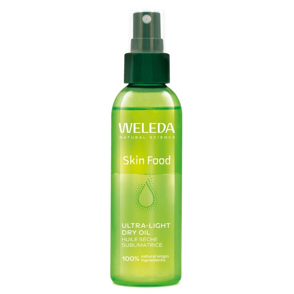 Groene sprayfles WELEDA Skin Food Ultra-Light Dry Oil, Franse belettering.