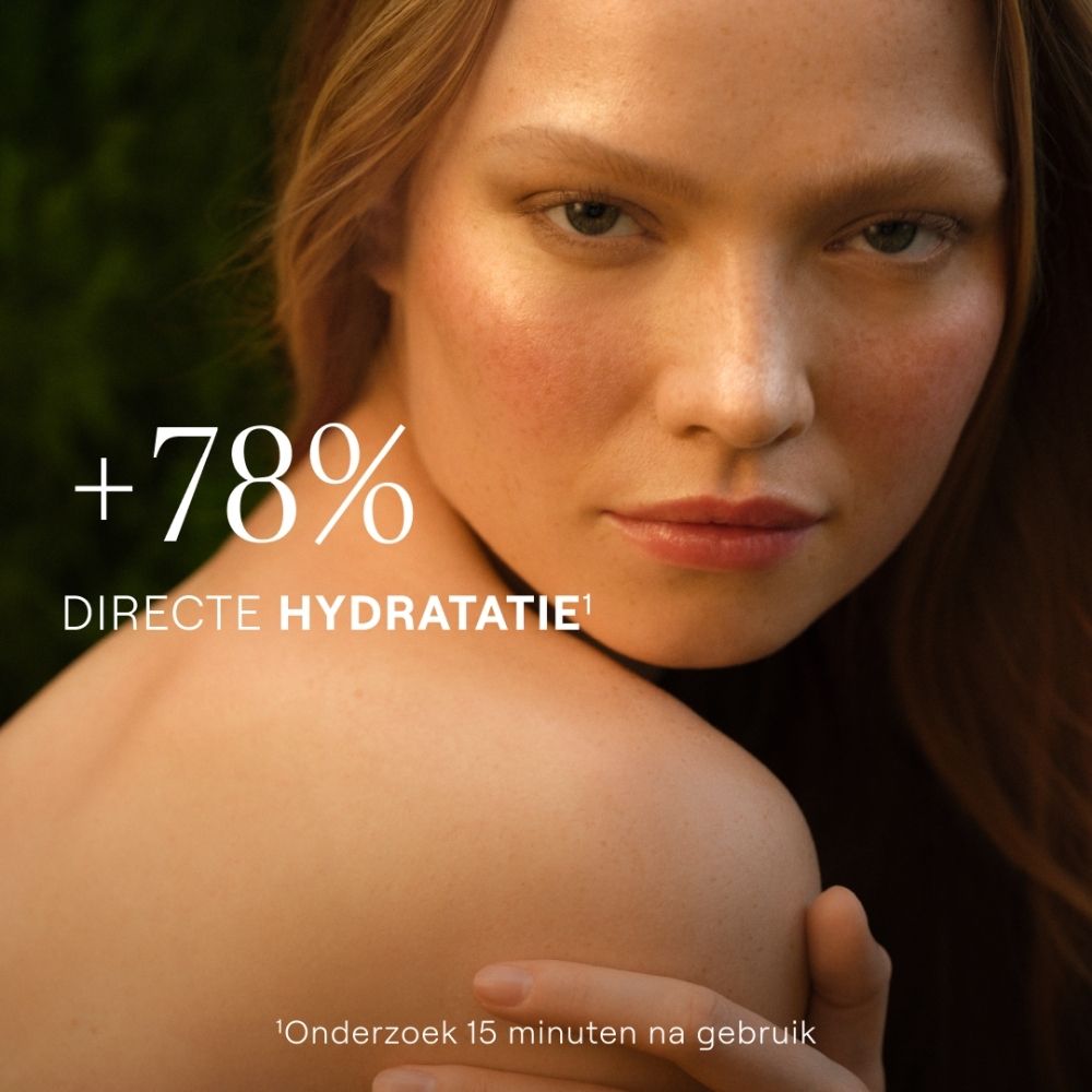 WELEDA Skin Food producten, Nederlandse belettering, focus op de droge olie sprayfles.