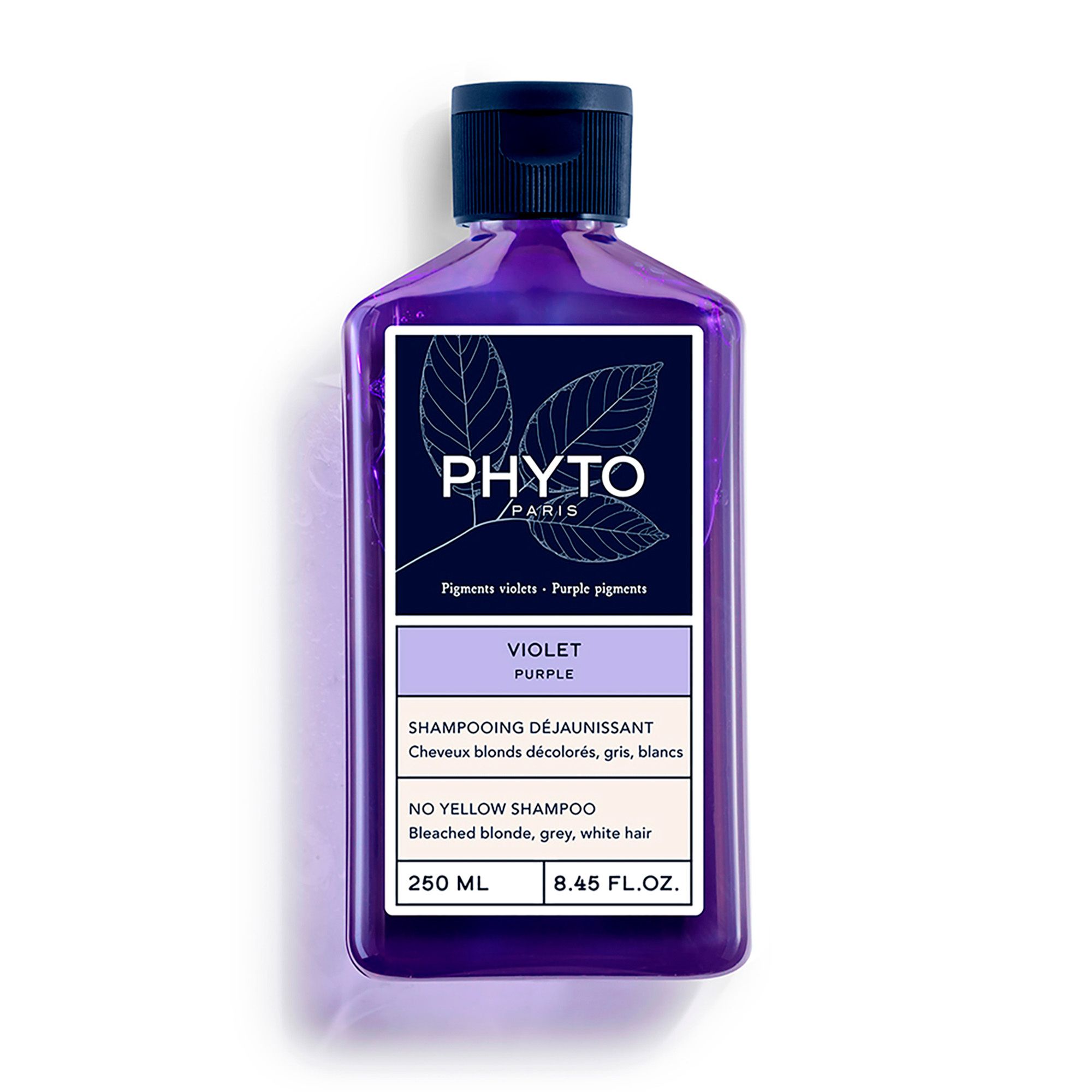 Shampooing violet Phyto Paris. Bouteille avec bouchon bleu foncé et étiquette. Texte: Violet, No Yellow Shampoo, 250 ml.