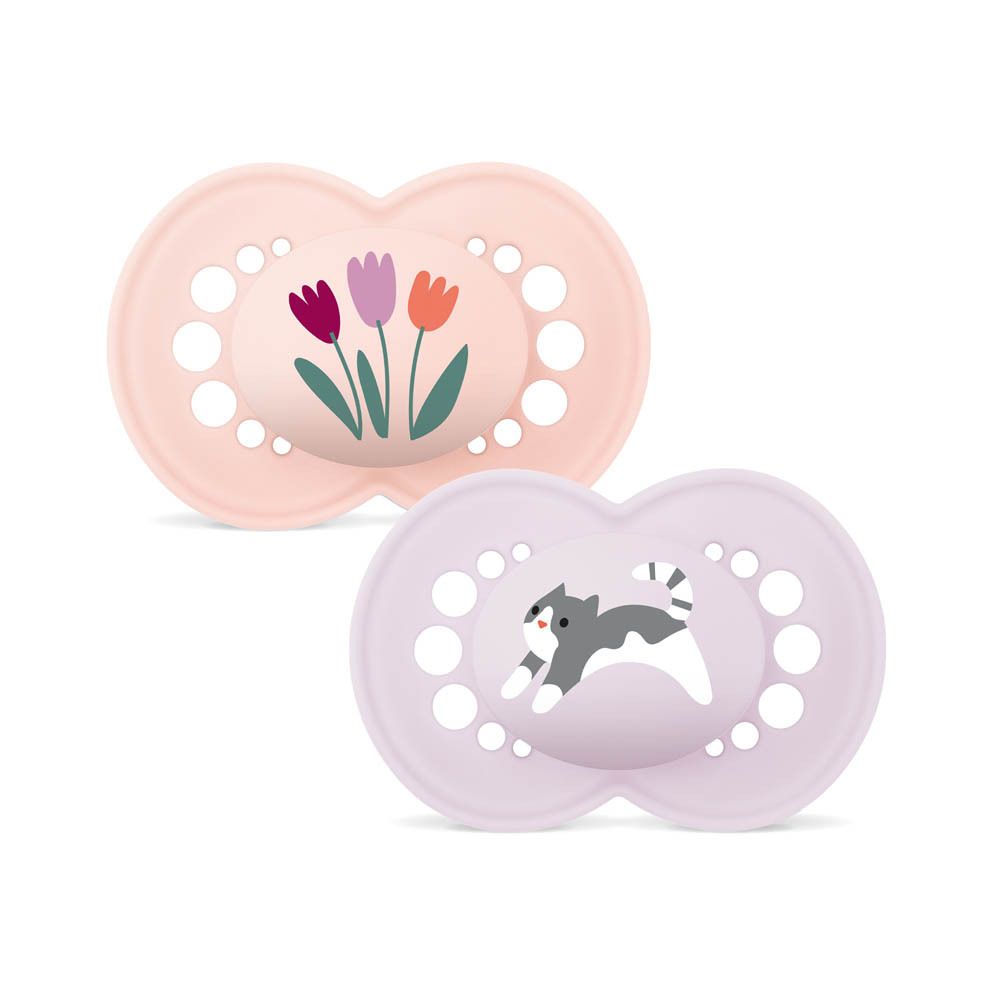 Twee MAM Original Pure siliconen fopspeen, 16+ maanden, roze met bloemen en lila met kat, in winkelverpakking.