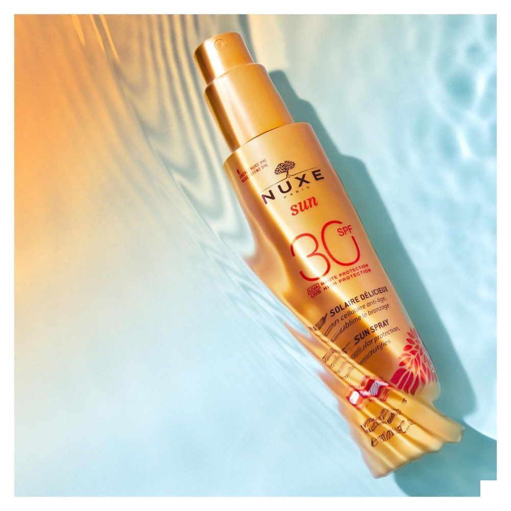 Spray solaire Nuxe SPF 30, 150ml, vue latérale.
