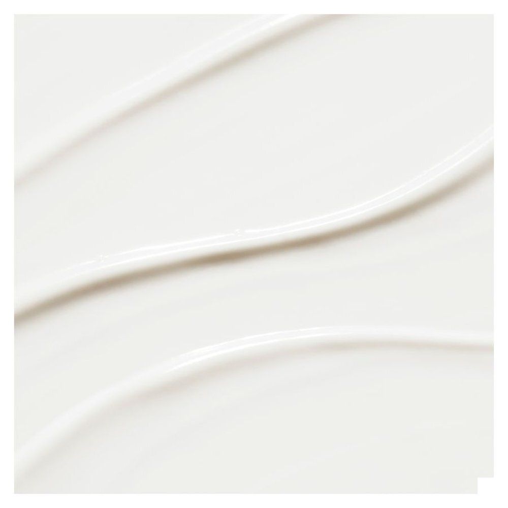 Achterkant van de NUXE zonnebrandspray SPF 50 met gebruiksinstructies.