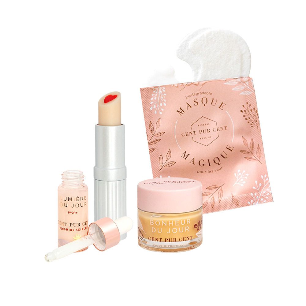 Productset met lippenbalsem, serum, oogmasker en crème. Alle producten zijn op een witte achtergrond geplaatst.