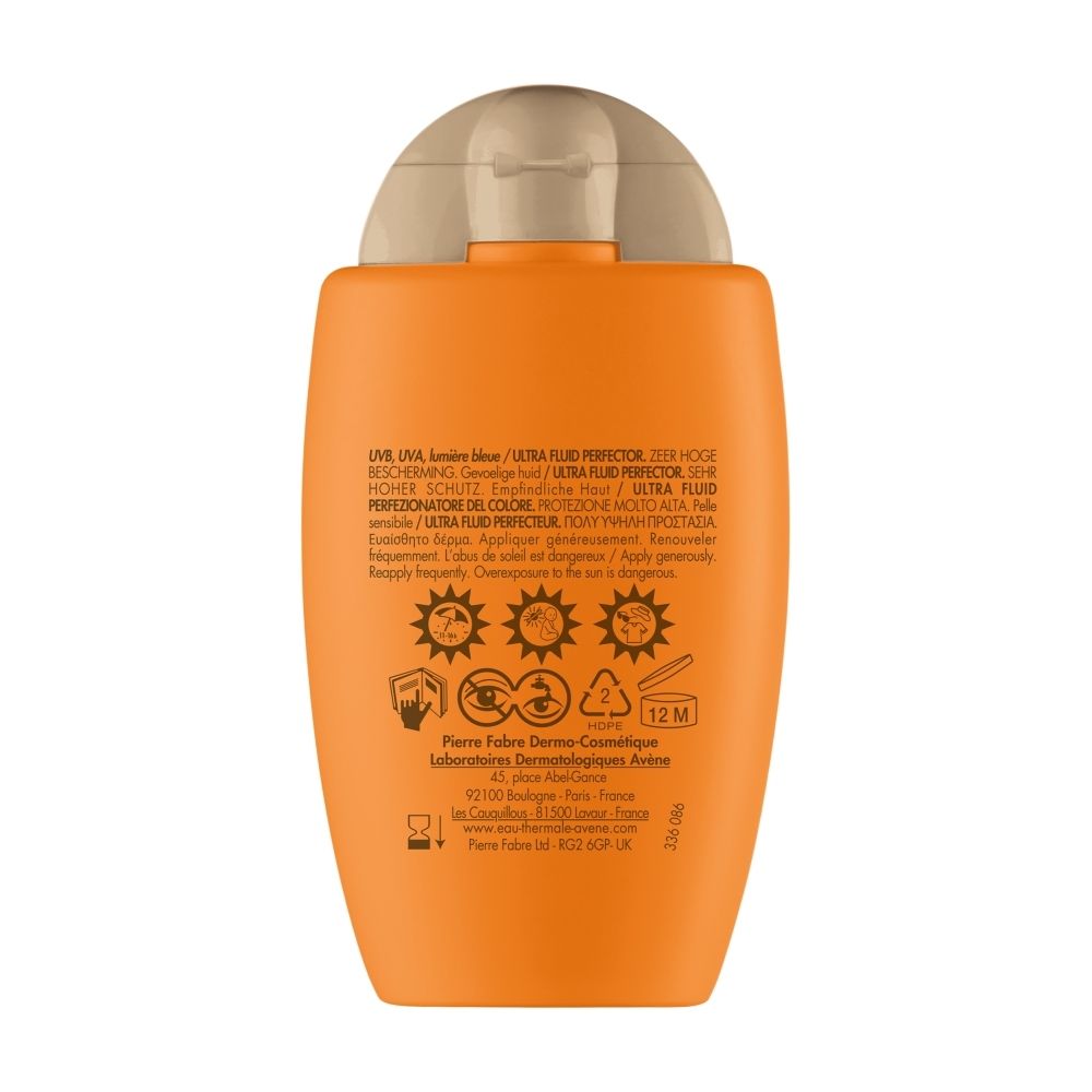 Dos du flacon orange. Texte multilingue. Pictogrammes.