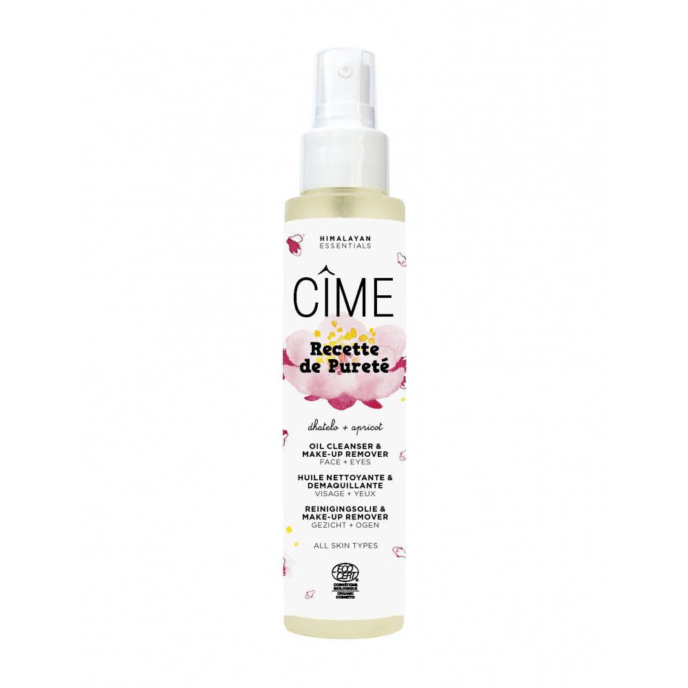 Transparante fles met verstuiver. Opschrift Cîme, Recette de Pureté, Reinigingsolie. Bloemenmotief en logo.