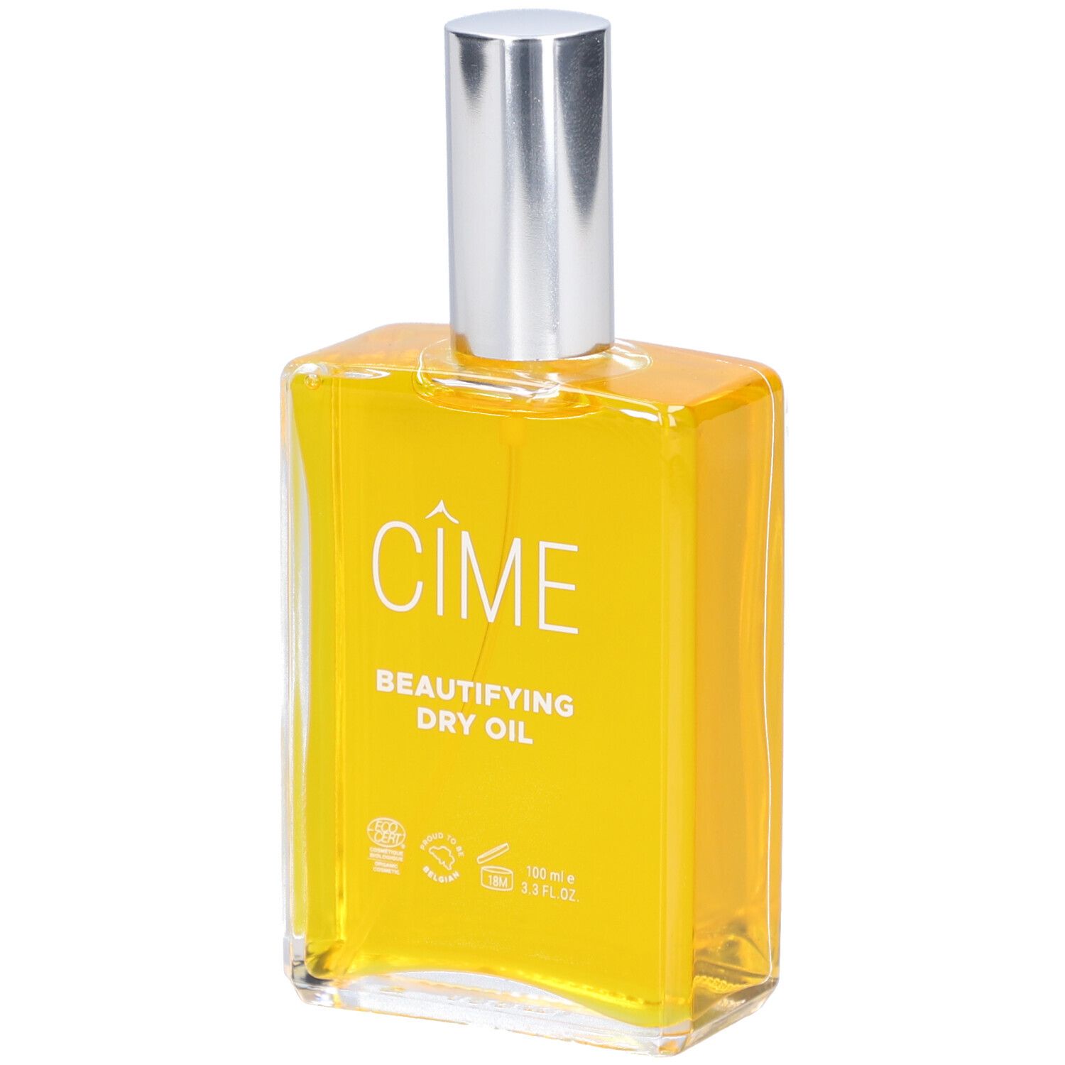 Glazen fles met gele olie, zilveren sproeikop en wit etiket met tekst. Cîme product.