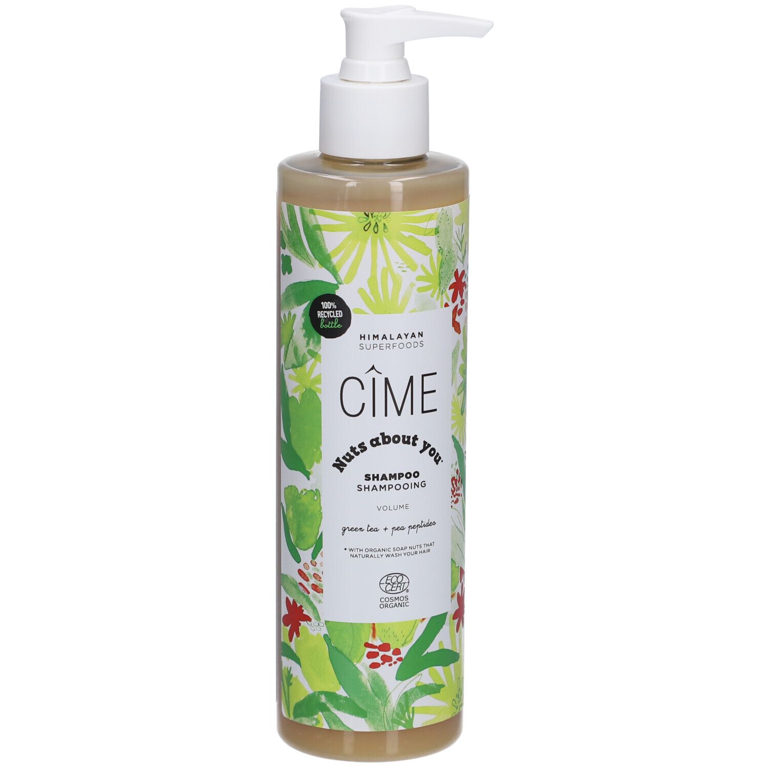 Shampoo fles met witte pomp. Opschrift: Cîme, Nuts about you, Shampooing Volume. Groen-wit bloemenpatroon.