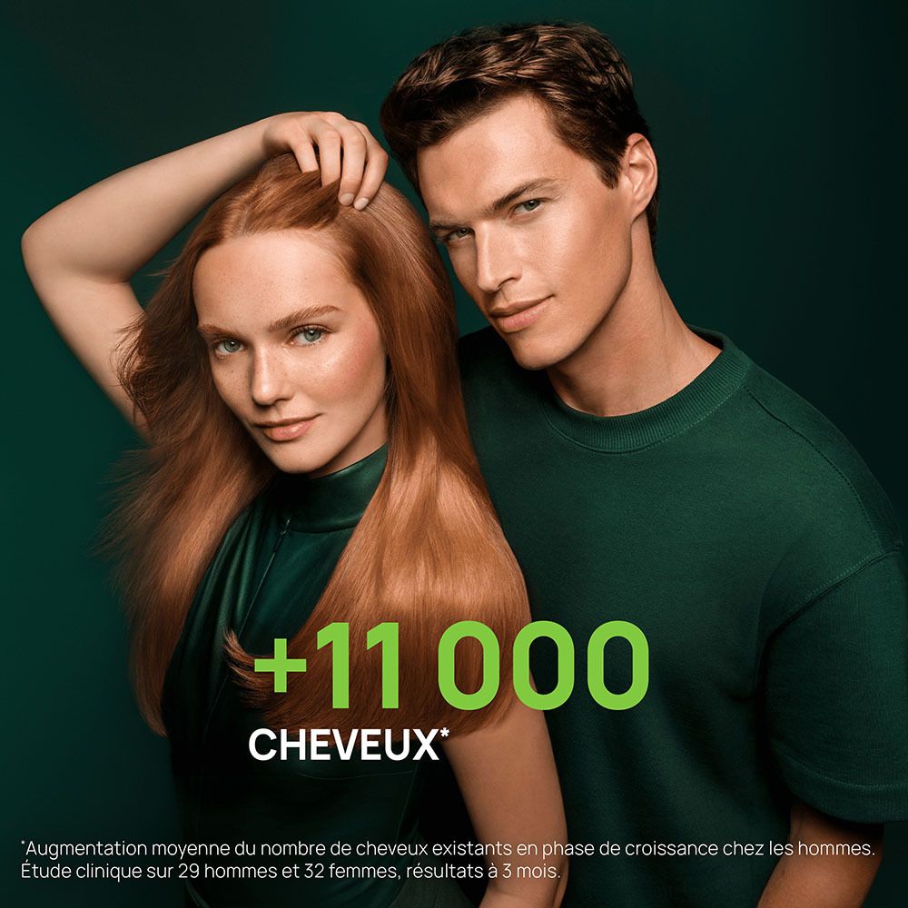 Couple posant. Femme aux cheveux roux, homme en chemise verte. Image du produit.