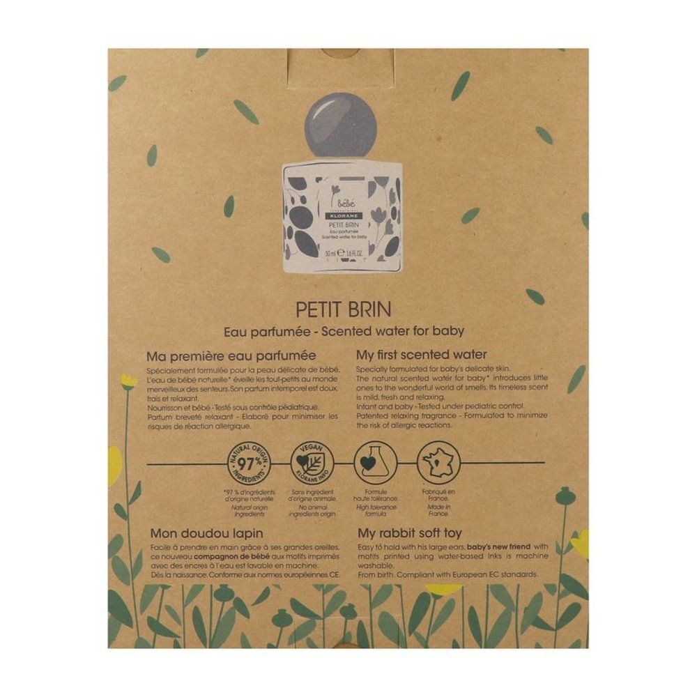 Achterkant van de geschenkverpakking. Productafbeelding, tekst en logo's. Klorane Bébé, Petit Brin. Certificeringen.