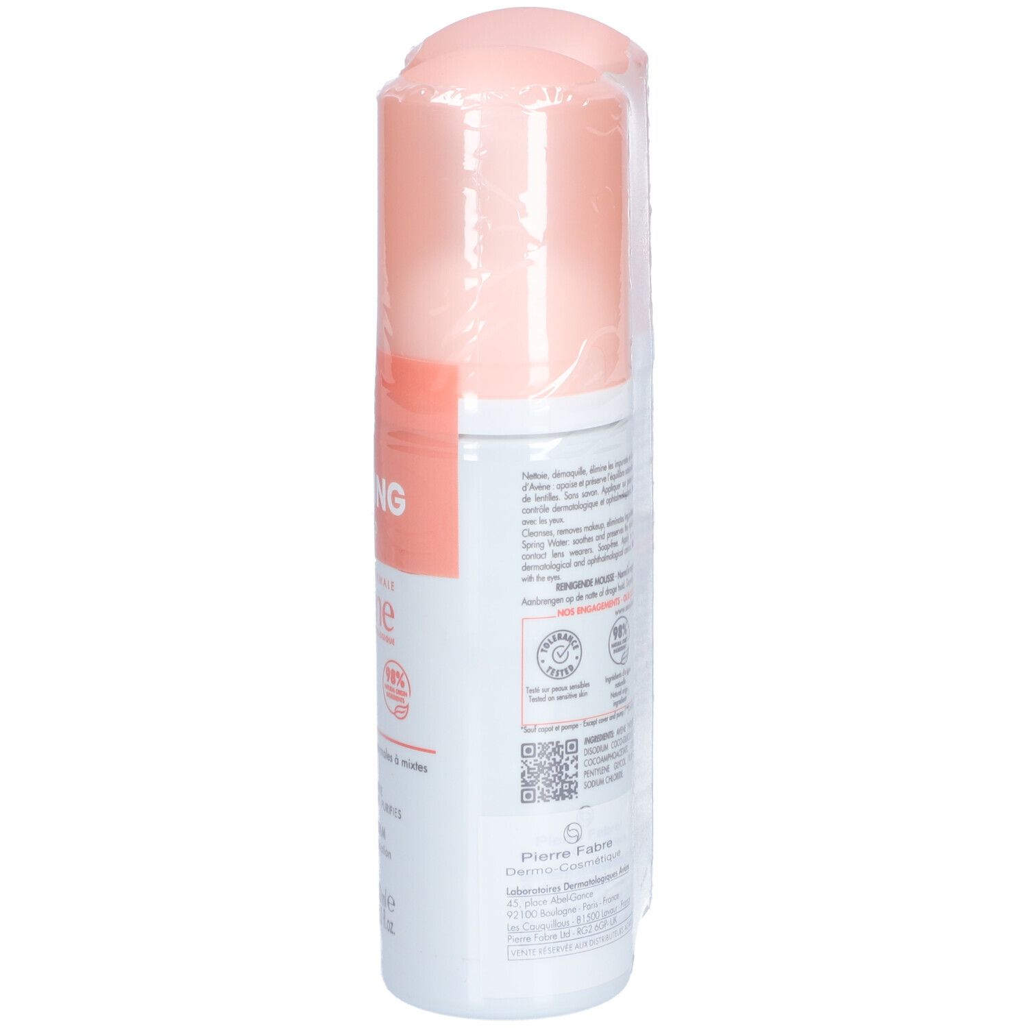 Reinigingsschuimfles in transparante folie. Roze dop, wit etiket met tekst. Vegan keurmerk. Zijaanzicht.