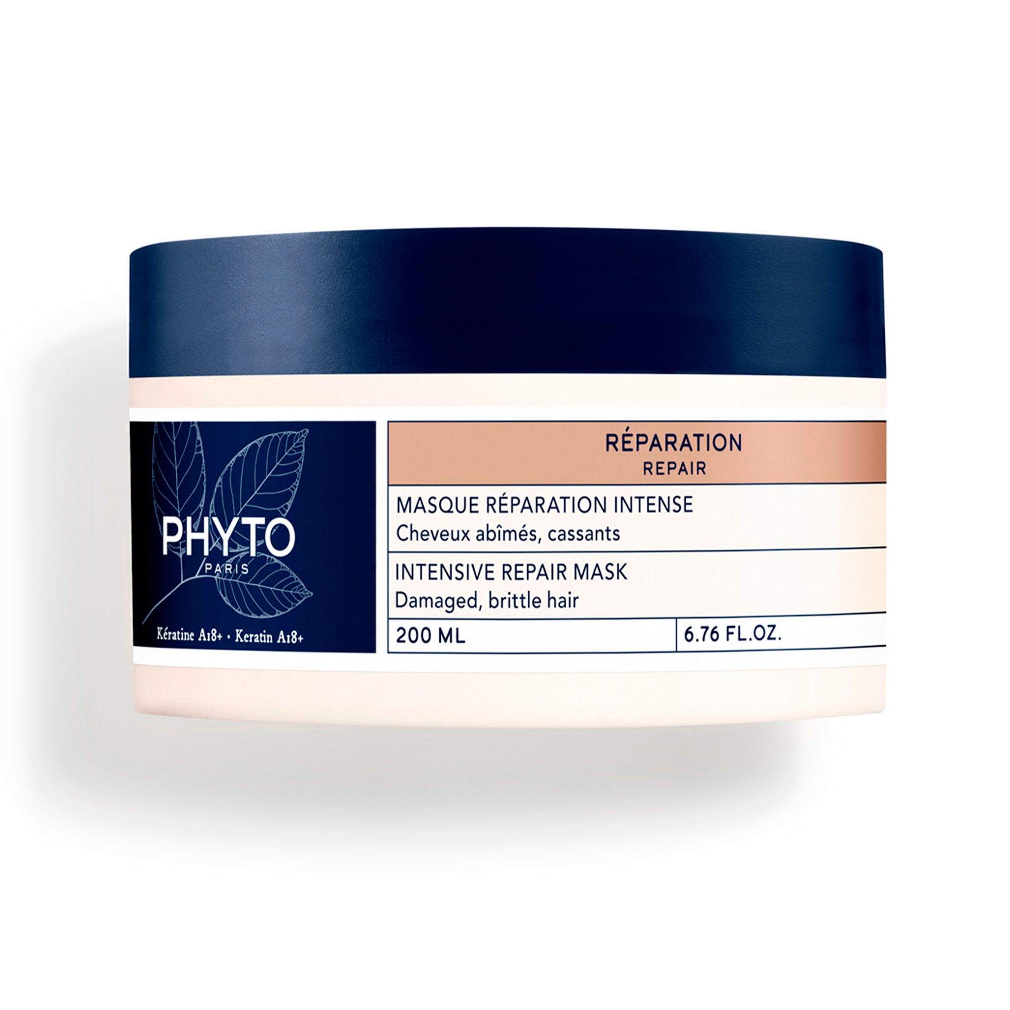 Ronde pot met blauwe deksel. Opschrift PHYTO PARIS. Etiket met productinformatie: Intensive Repair Mask. 6.76 FL.OZ.