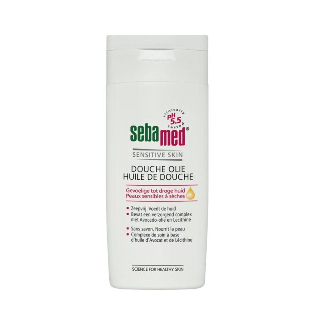 Witte Sebamed Douche Olie fles. Groen logo, gele druppel. Tekst: Gevoelige huid, Science for Healthy Skin.