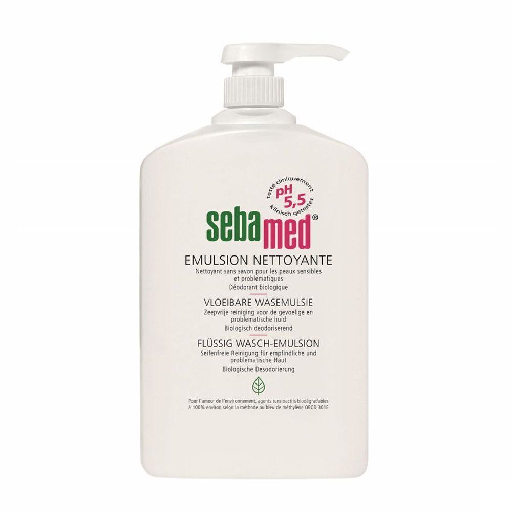 Witte fles met pomp. Opschrift: Sebamed, Emulsion Nettoyante. pH 5,5. Tekst in het Duits, Nederlands en Frans.