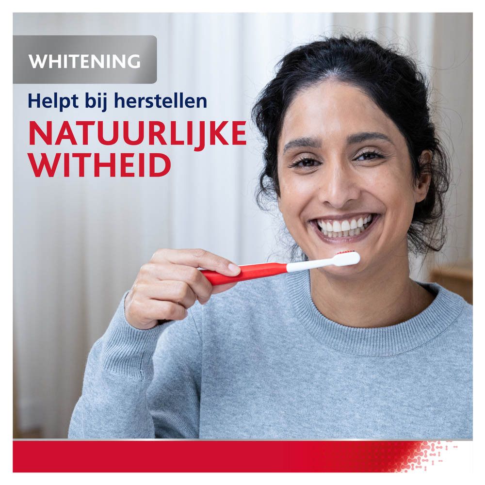 Tandpasta tube en tandenborstel. Wit, met rode en blauwe tekst. Opschrift: Parodontax Active Repair Tandvlees Whitening.