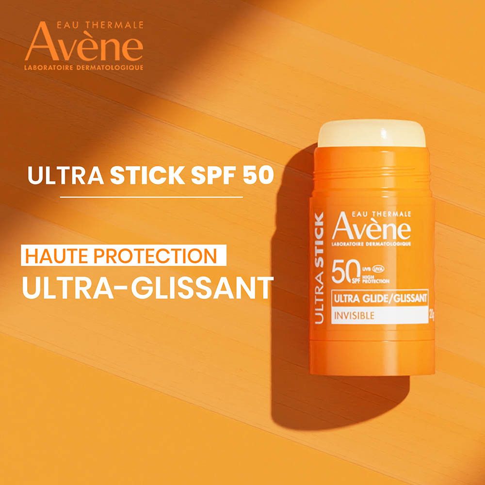 Stick solaire orange. Marque Avène, Ultra Stick, SPF 50. Texte: Ultra Glide/Glissant, Invisible.