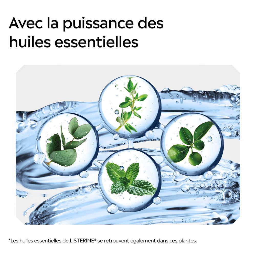 Bouteille Listerine Total Care, 500ml, avec éclaboussures et bulles.