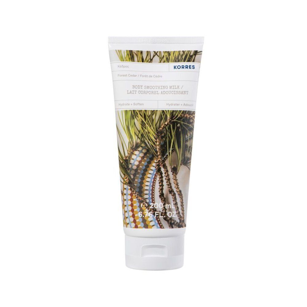Lait corporel lissant en tube. Marque Korres. Inscription : Body Smoothing Milk. Illustration de plantes et de perles.