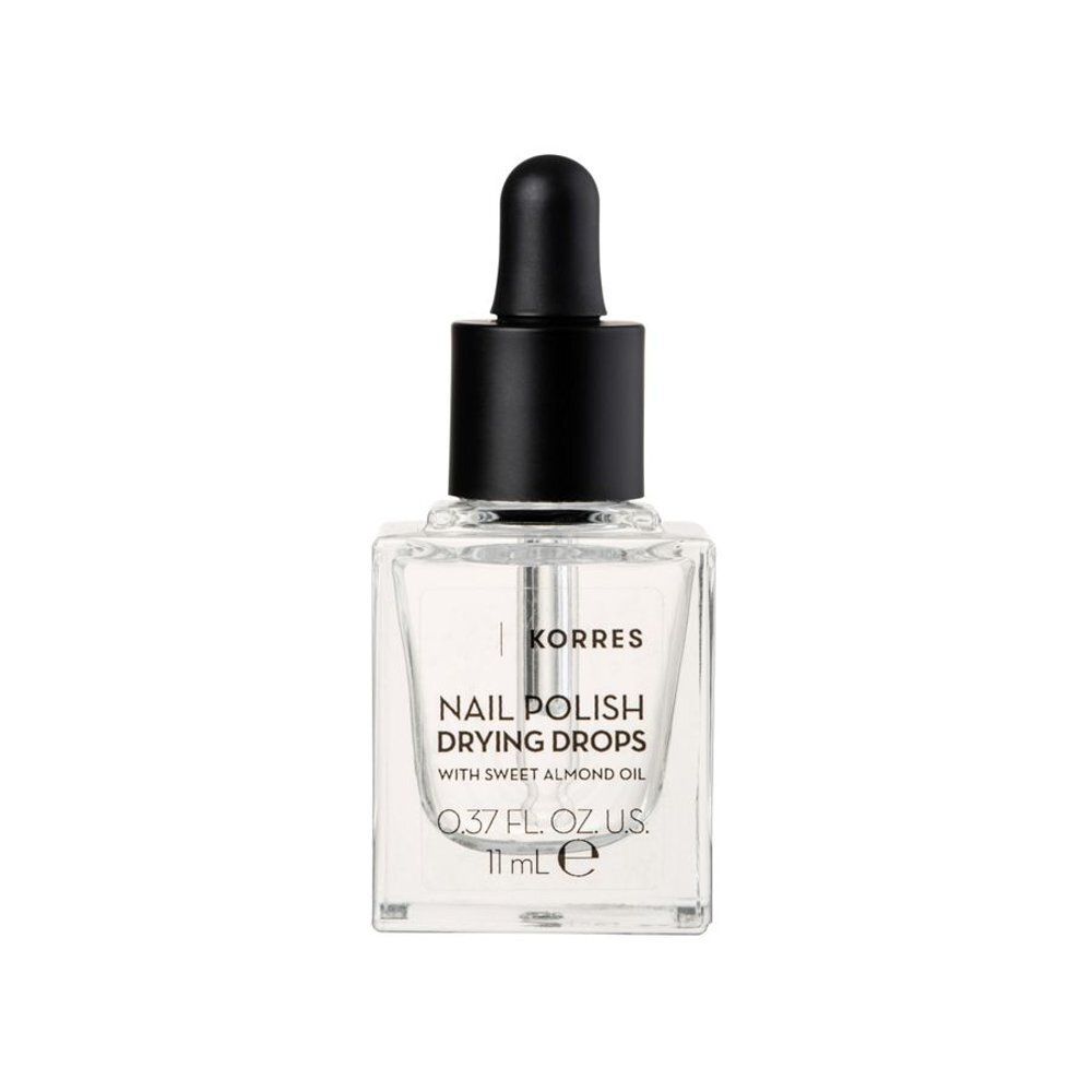 Transparante fles met zwarte dop en pipet. Opschrift: Korres Nail Polish Drying Drops. 11 ml.