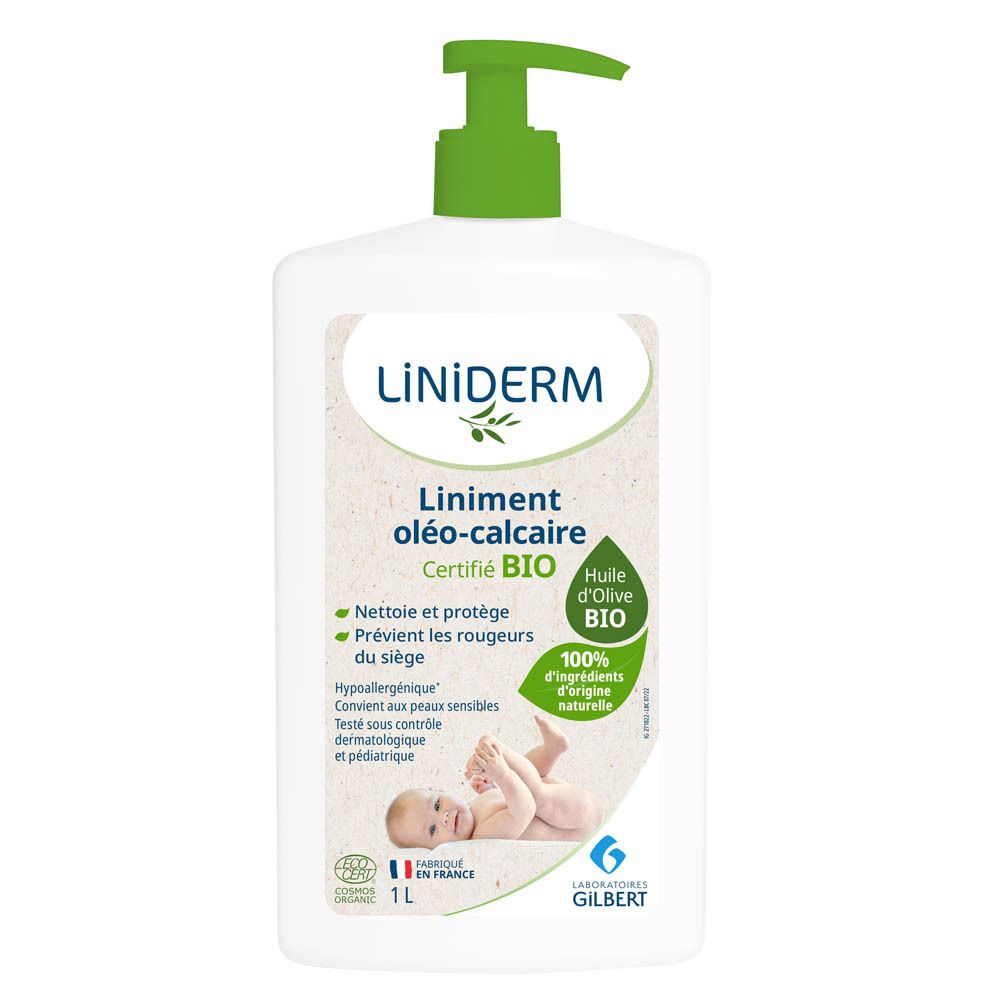 Witte fles met groene pomp. Opschrift: Liniderm, Liniment oléo-calcaire, Bio-certificering. Bevat olijfolie. Baby afbeelding.