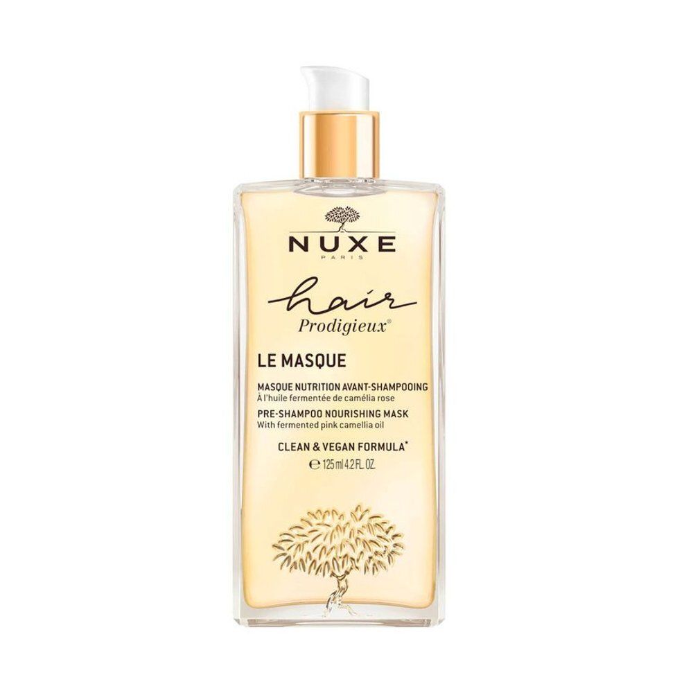 NUXE haarmasker in een doorzichtige fles met pompdispenser. Bevat 125ml.