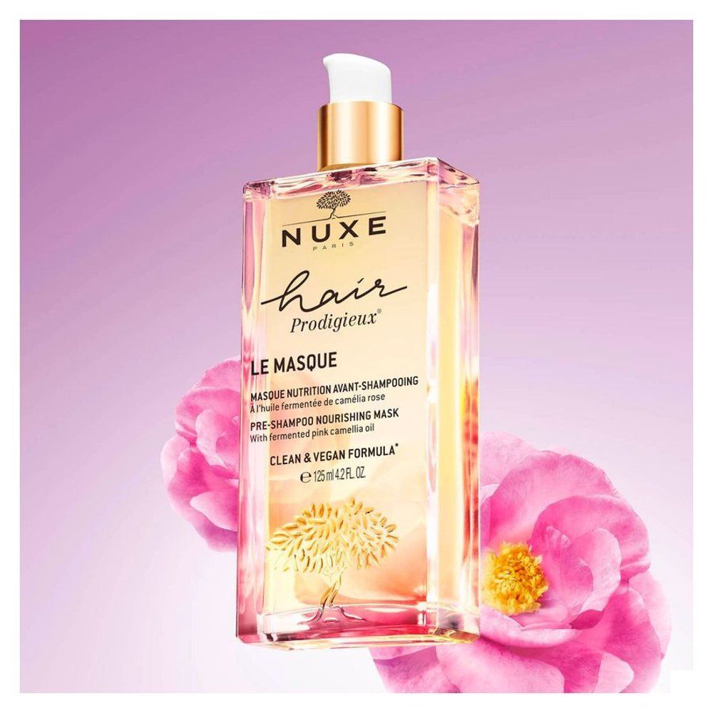 Masque capillaire NUXE avec étiquette violette et motif floral. 125ml.