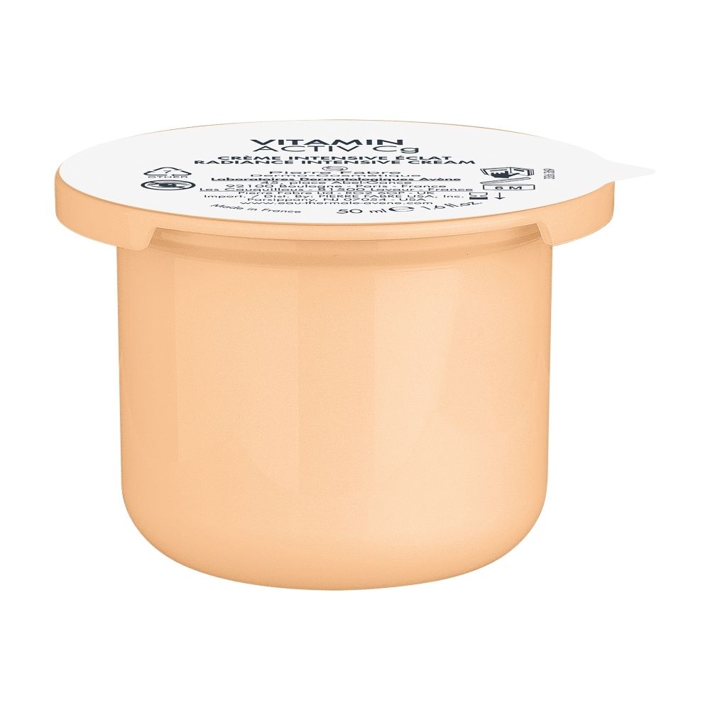 Pot de crème beige. Inscription : Vitamin Activ Cg. Couvercle avec inscription.