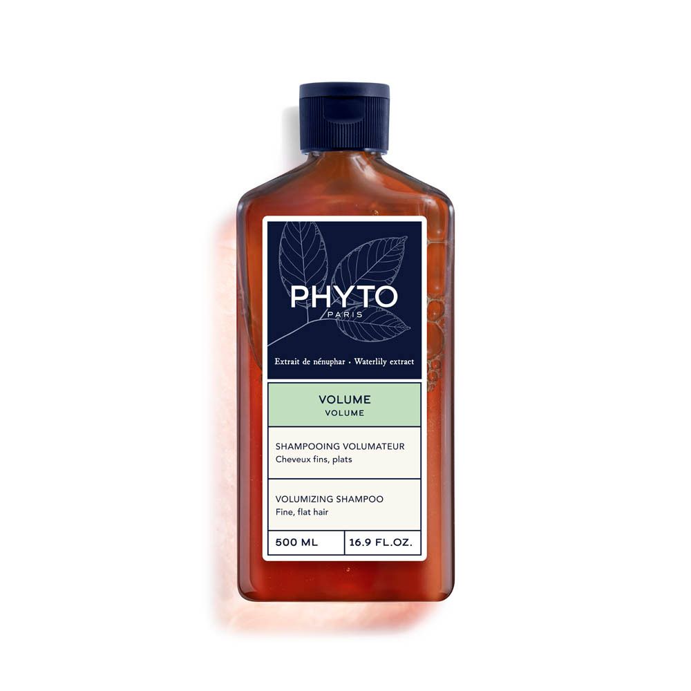Bruine fles met blauwe dop. Label met "PHYTO PARIS", "VOLUME" en "SHAMPOOING VOLUMATEUR".