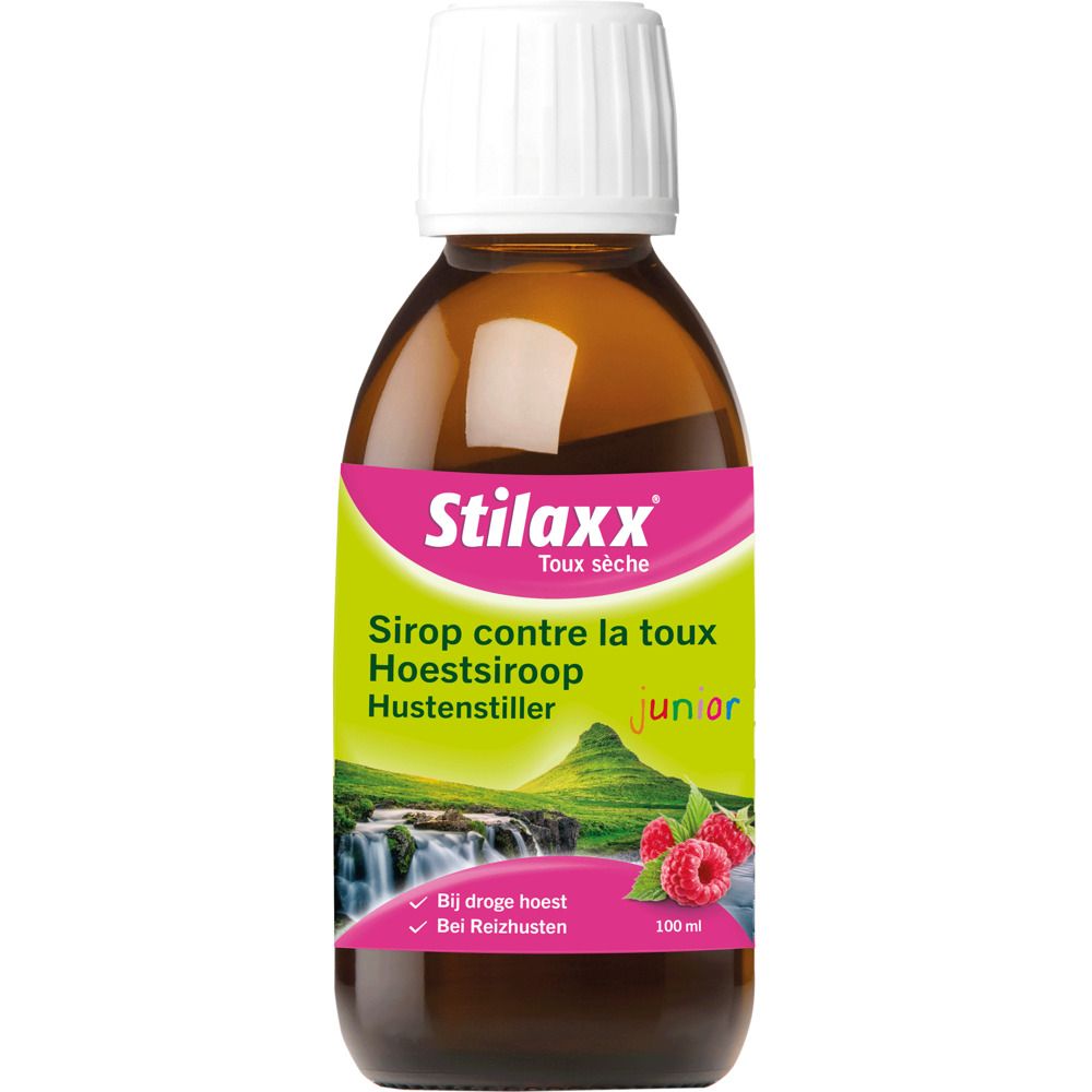 Bouteille de sirop Stilaxx avec framboises. Étiquette avec nom du produit et texte multilingue.