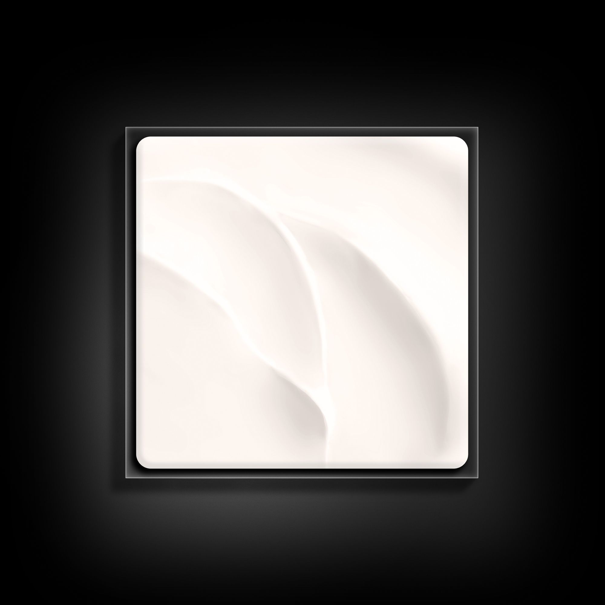 Vue de dessus d'une surface de crème carrée. Crème couleur crème avec des structures ondulées.