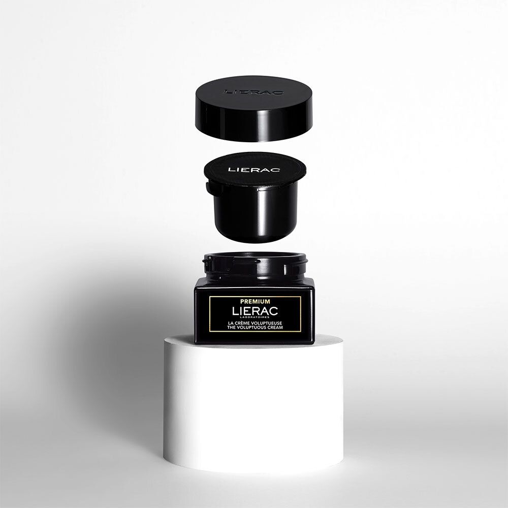 Composants du produit : pot, couvercle et couvercle intérieur. Couleur noire, marque Lierac visible.