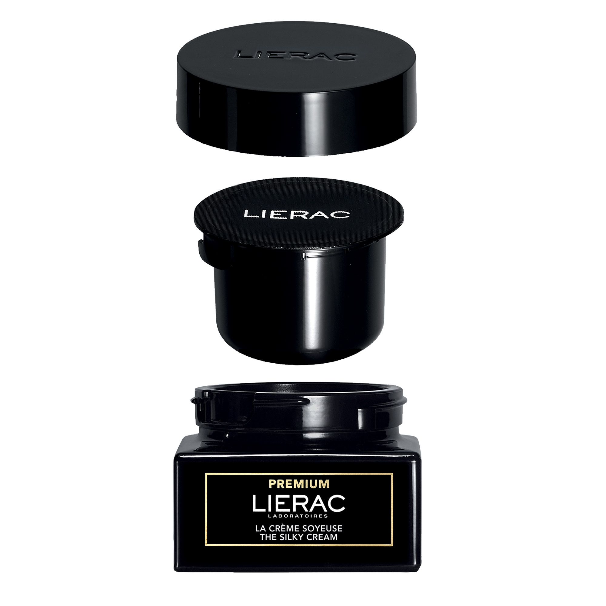 Zwarte potten en deksels, gedeeltelijk geopend. Productnaam en merk zichtbaar.