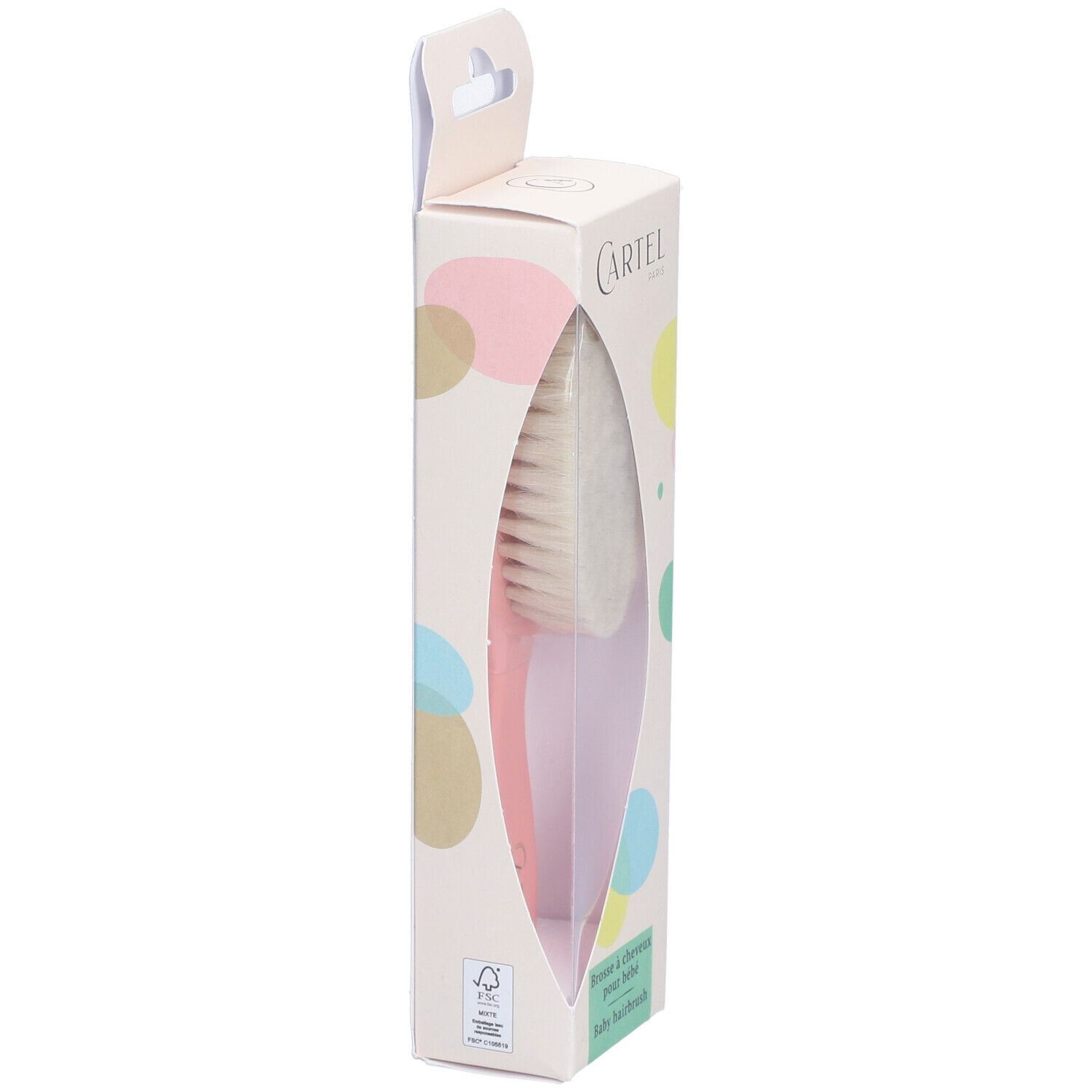 Brosse à cheveux pour bébé en emballage, vue latérale. Brosse avec tête en poils clairs et manche rose. Boîte avec logo.