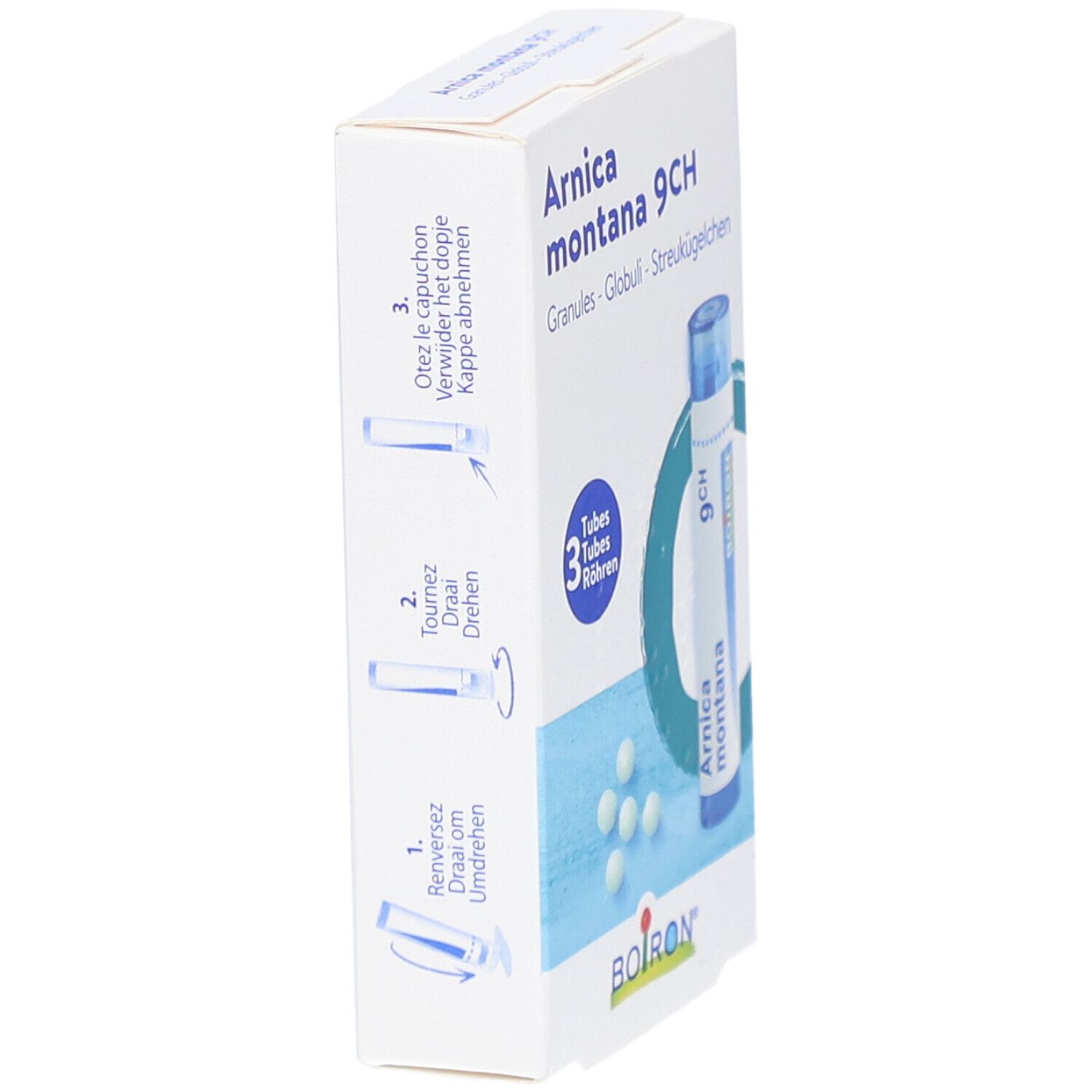 Schuine doos Boiron Arnica montana 9CH. Toont openingsinstructies. Blauw-witte verpakking met productinformatie.
