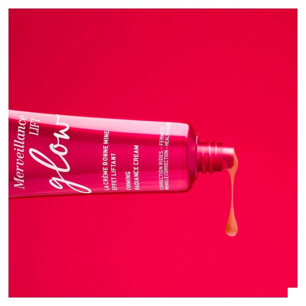 Zijkant van een Nuxe Merveillance Lift Glow crème doosje met ingrediënten.