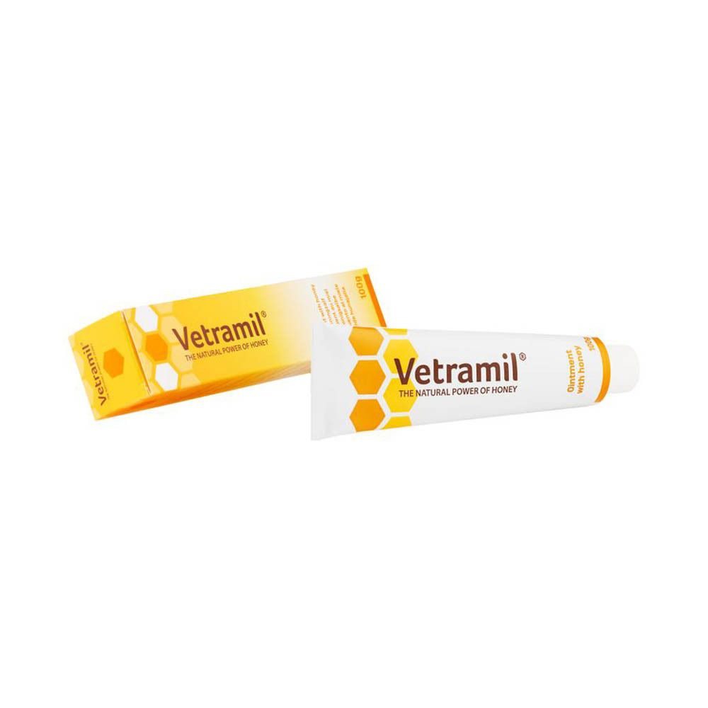 Tube en doos. Tube en doos met honingraatontwerp. Opschrift: Vetramil, Ointment with honey.