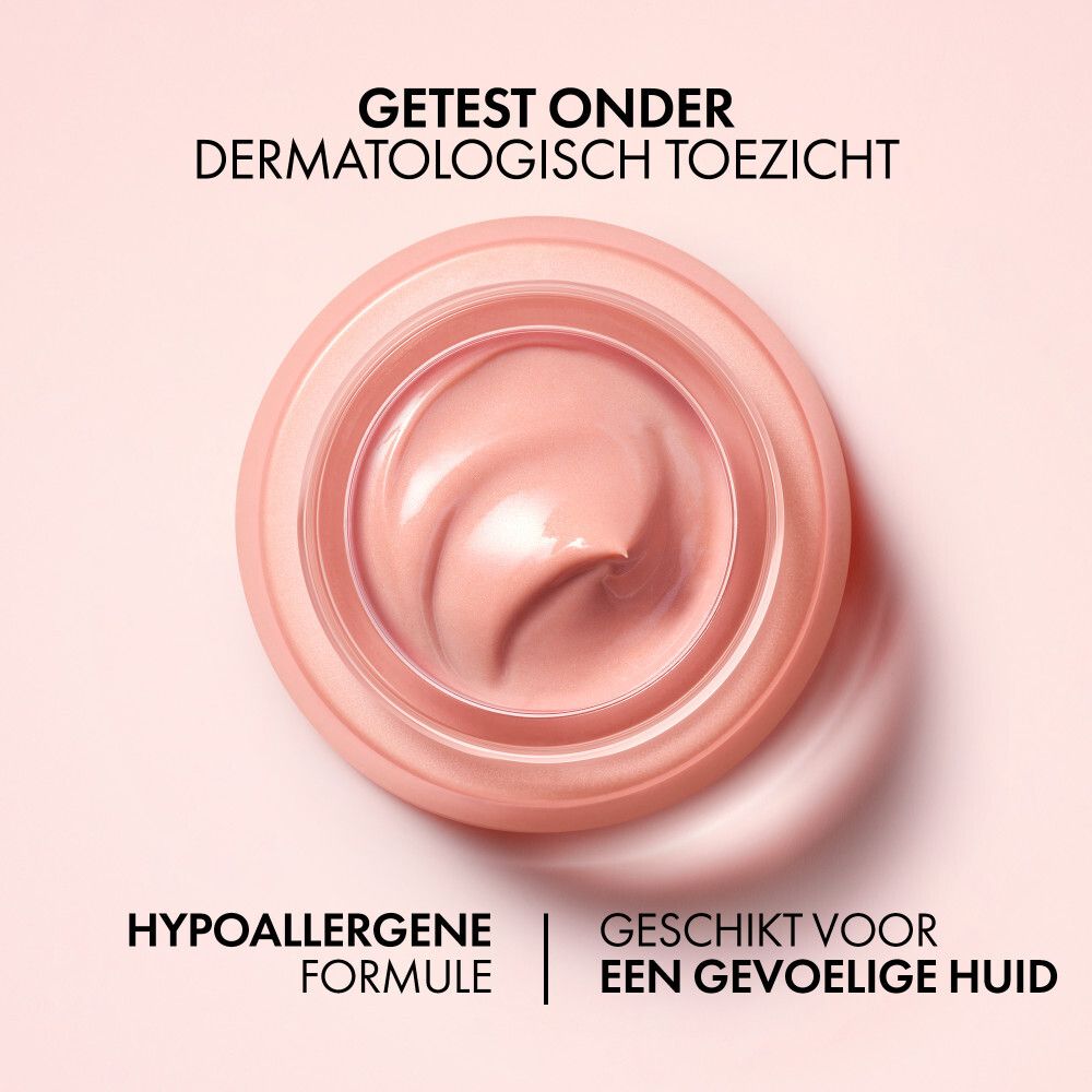 Bovenaanzicht van roze crème. Tekst: Getest onder dermatologisch toezicht, Hypoallergene formule, Geschikt voor een gevoelige huid.