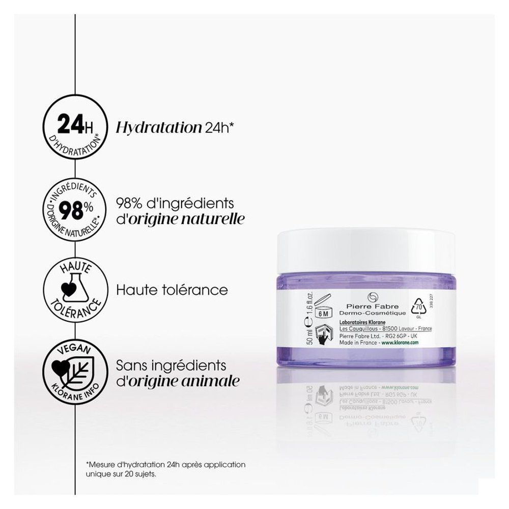 Pot de crème avec couvercle blanc. Inscription : Klorane, Gel Crème Repulpant Hydratant 24H. Illustration de fleur bleue.