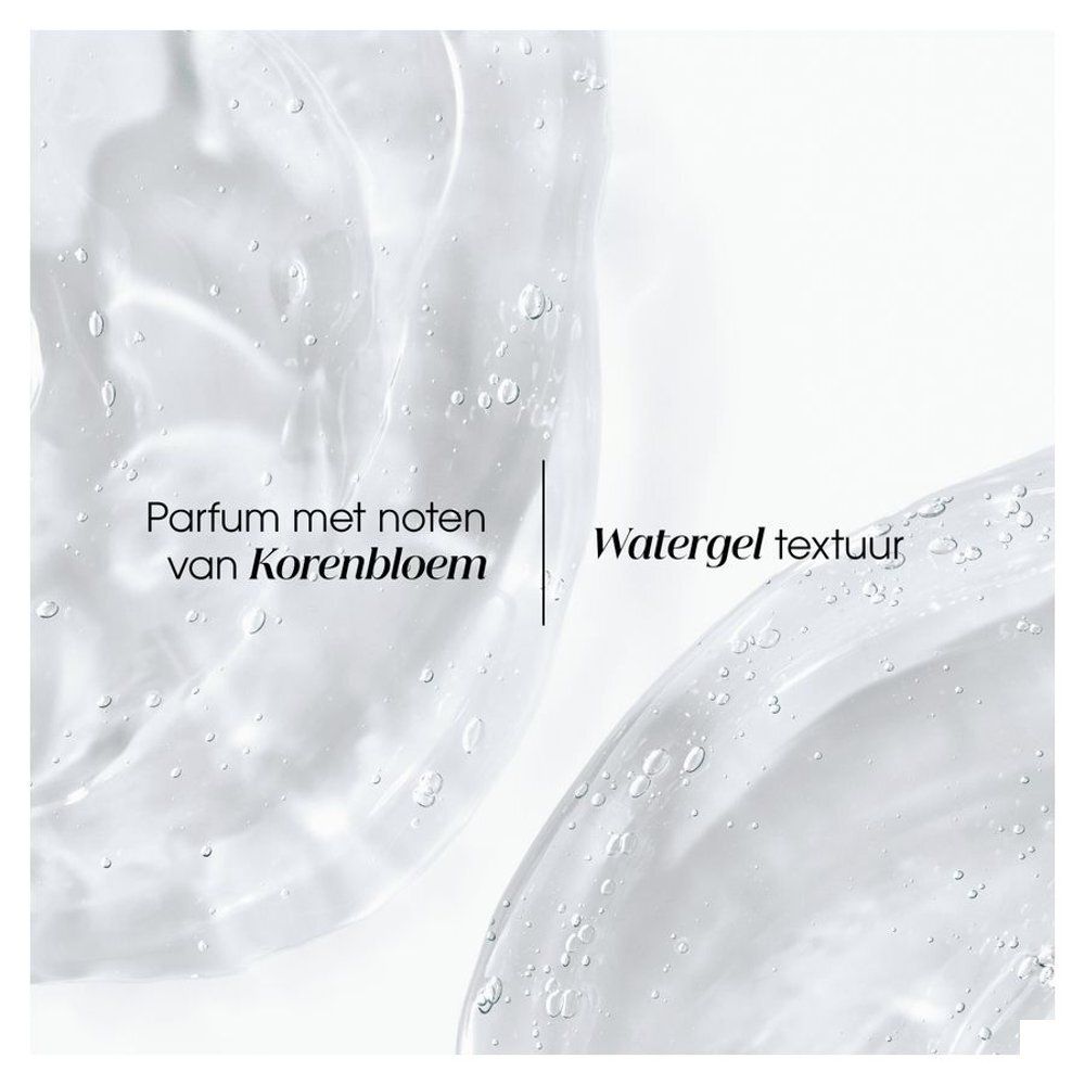 Crèmepot met witte deksel. Opschrift: Klorane, Gel Crème Repulpant Hydratant 24H. Blauwe bloem illustratie.