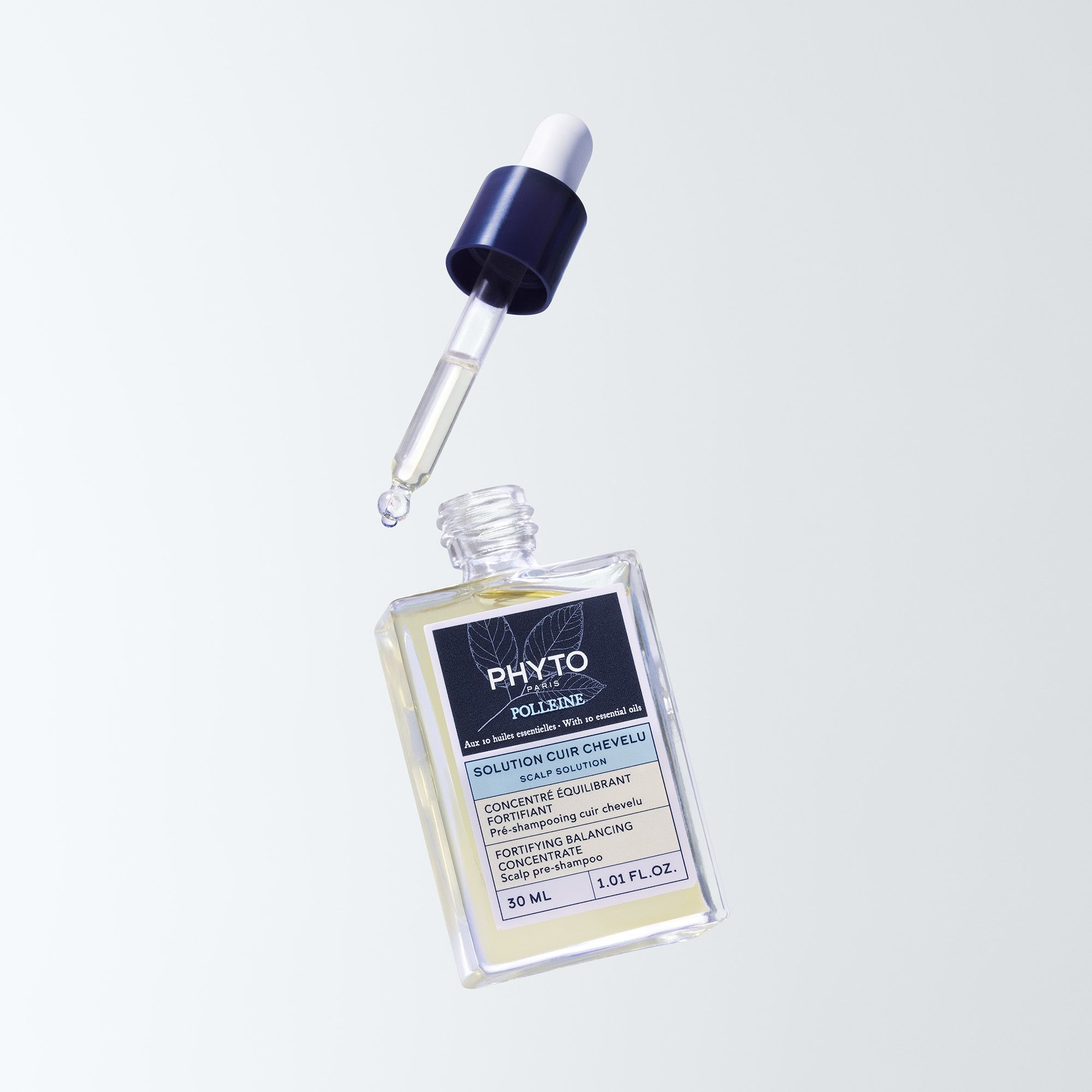 Fles met pipet. Opschrift: Phyto Polleine Solution Cuir Chevelu.
