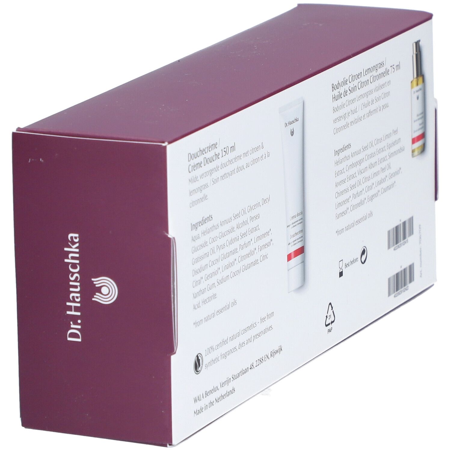 Achterkant van de geschenkdoos met productinformatie. Bevat: Douchecrème, Bodylotion, Bodyolie. Tekst: Ingrediënten, Dr. Hauschka logo, recyclingsymbolen.