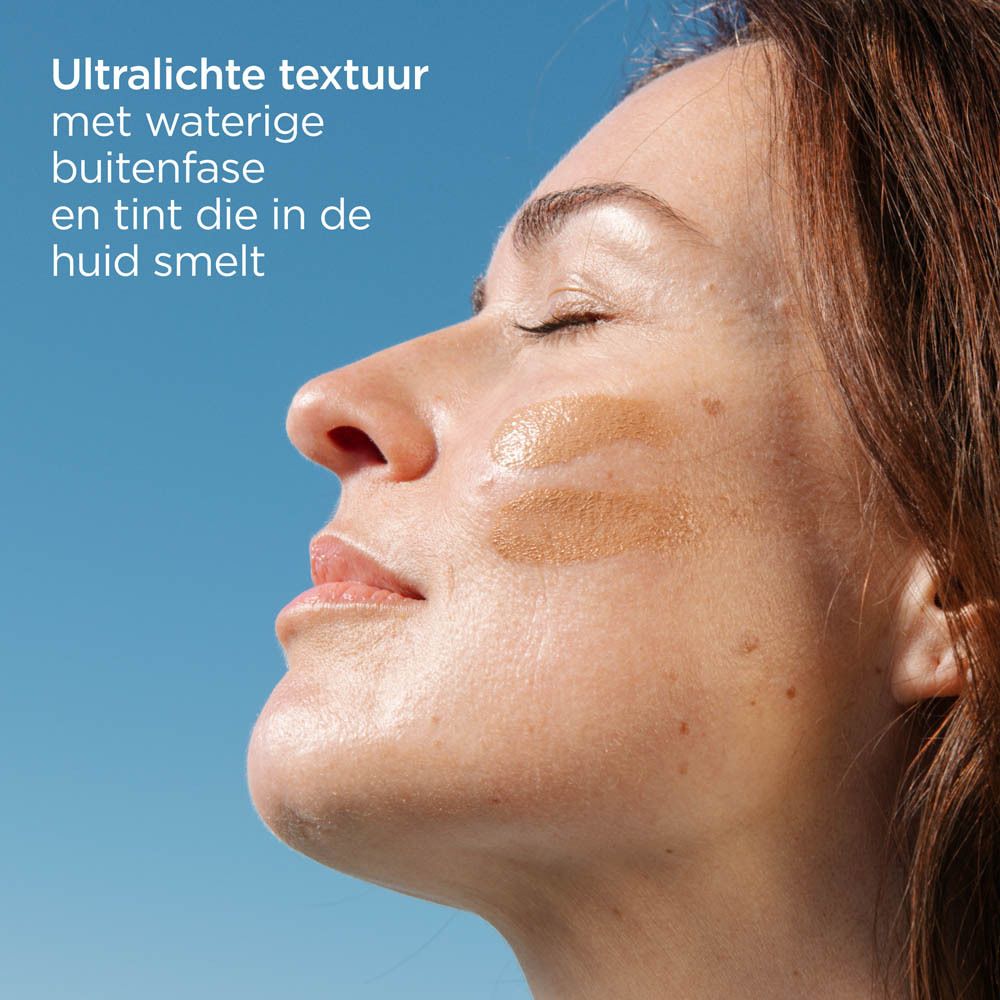 ISDIN Fotoprotector Fusion Water Magic Repair Color SPF50. Product op sokkel.