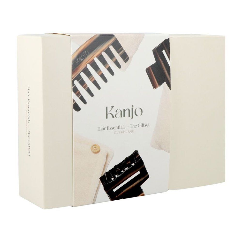 Beige geschenkverpakking met productillustraties. Opschrift "Kanjo Hair Essentials - The Giftset". Bevat haaraccessoires.
