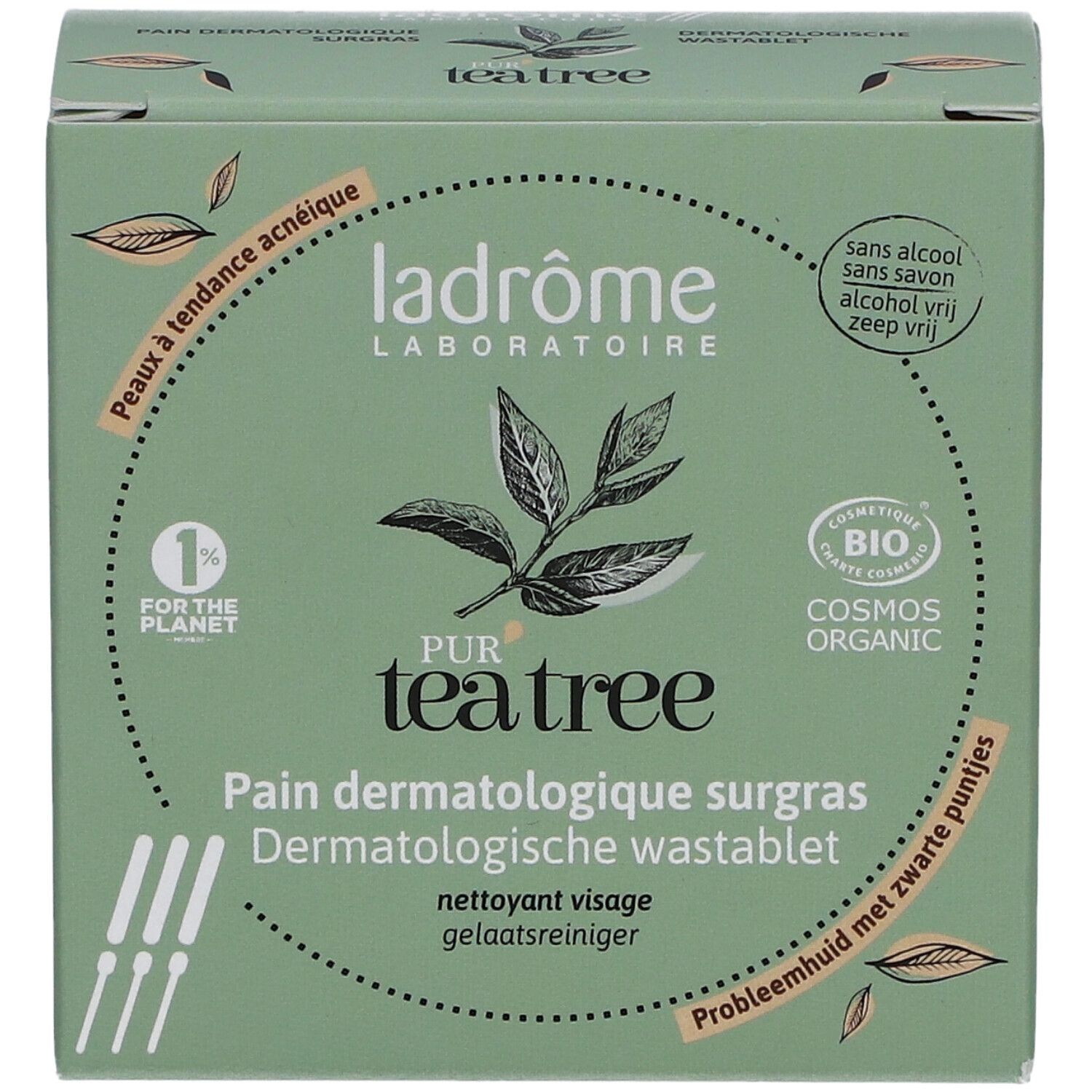 Groene doos met productnaam en logo. Tekst: Pur Tea Tree, Pain Dermatologique surgras, Dermatologische wastablet.